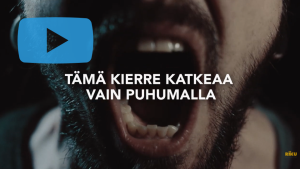 Ruutukaappaus videosta. Kuvassa huutava henkilö ja teksti: "Tämä kierre katkeaa vain puhumalla."